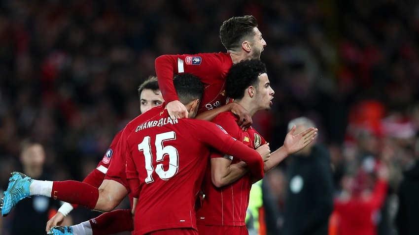 Jones stunner sees youthful Liverpool edge rivals Everton