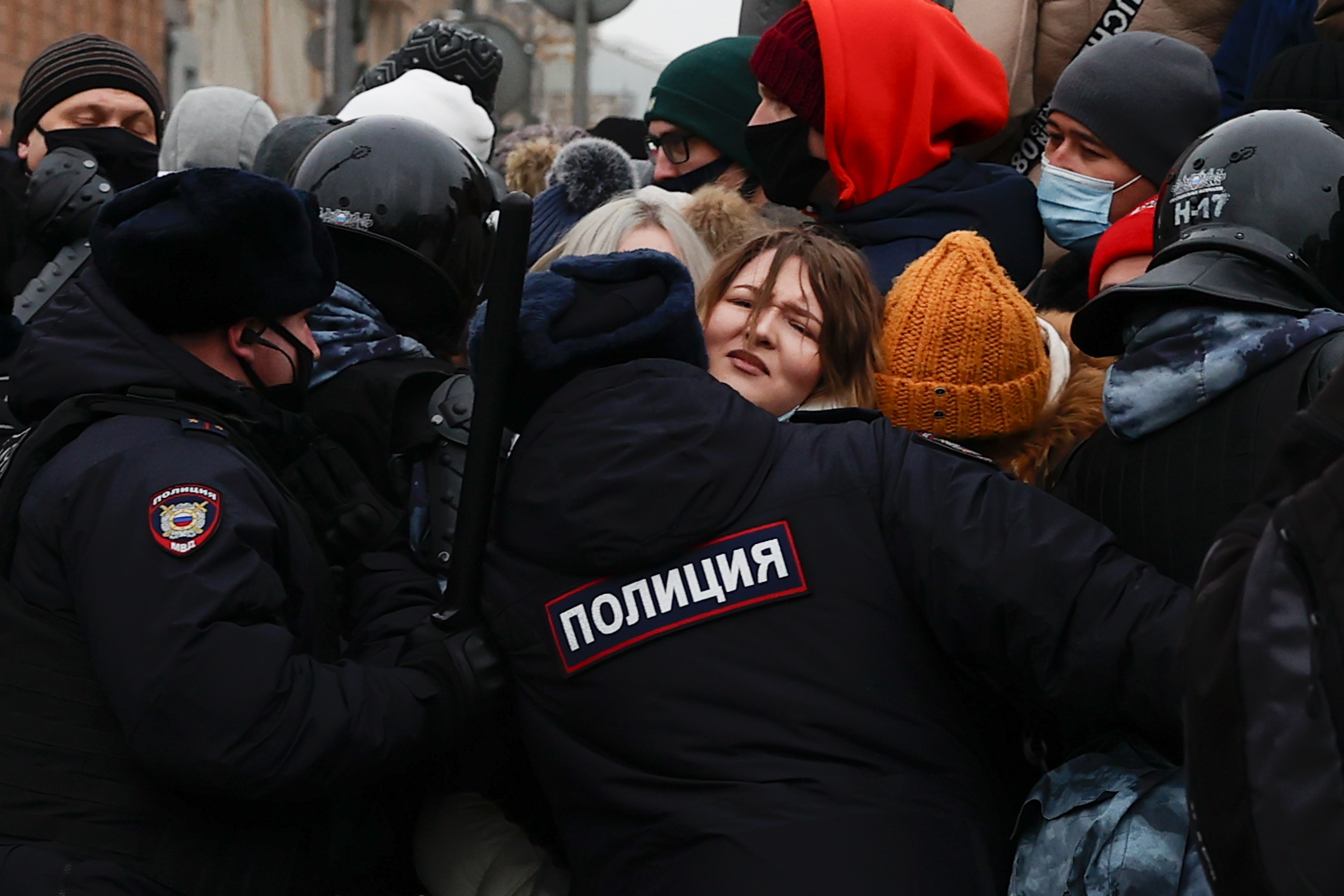 Police officers block the road during a protest demanding the release of Russian opposition figure Alexei Navalny in Moscow on 23 January.