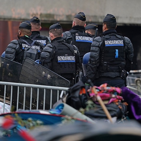 French police evacuate a makeshift migrant camp in Dunkirk, Northern France 