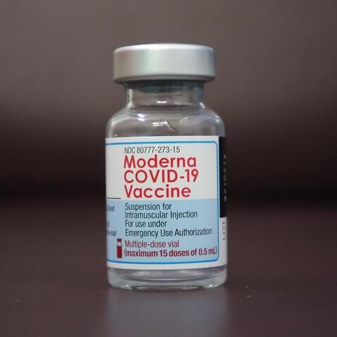 Close up shot of a vial of Moderna COVID-19 vaccine recently approved for children over 12 in Australia