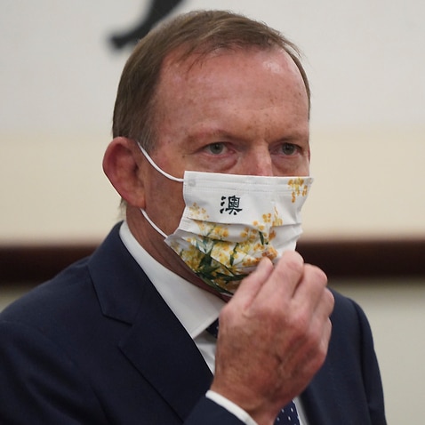 Former Australian Prime Minister Tony Abbott  during a meeting with Taiwanese President Tsai Ing-wen at the Presidential Office in Taipei.