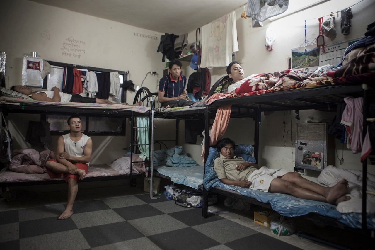 Nepalese workers in living quarters in Doha