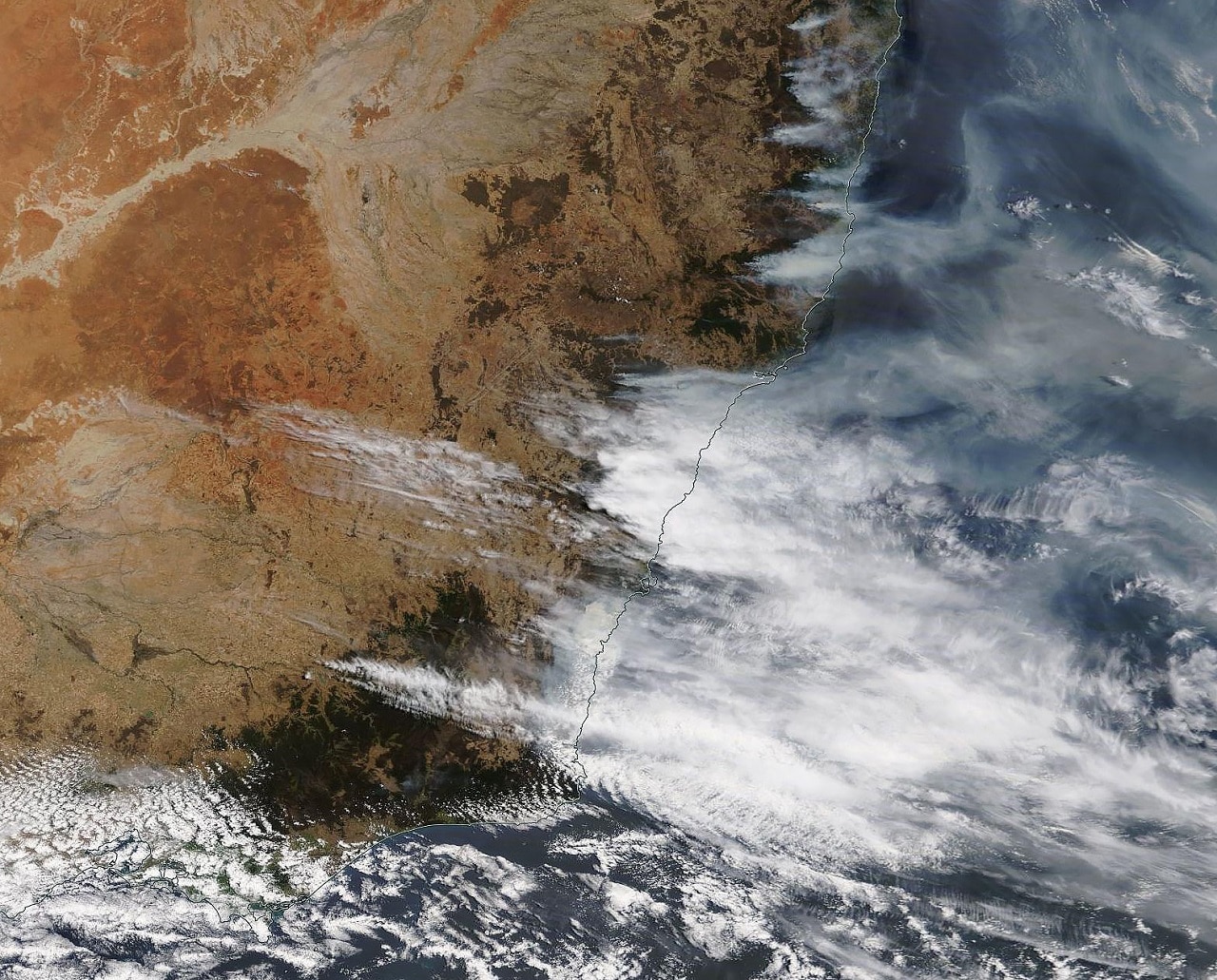 A NASA Worldview Satellite showing smoke NSW bushfires in early December. A NASA Worldview Satellite showing smoke NSW bushfires in early December.