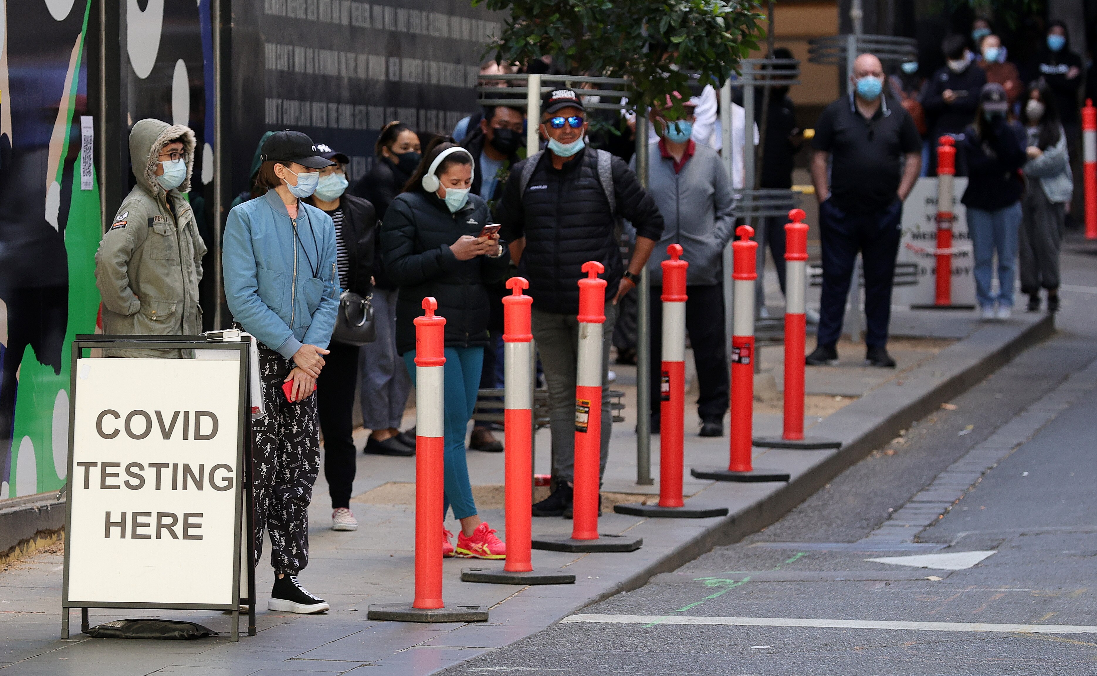A COVID testing queue in Melbourne. Lines are growing in the lead-up to Christmas. 