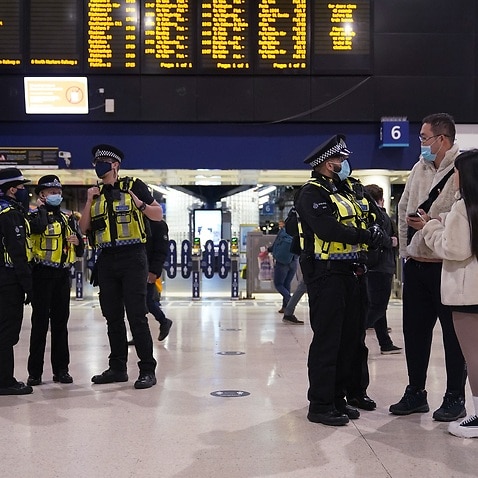 Police officers on patrol at Waterloo Station, London