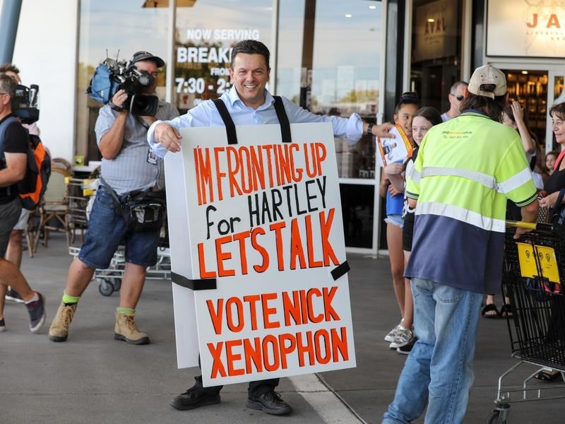 SA-Best leader Nick Xenophon wears a sandwich board to launch his election campaign in Adelaide. 