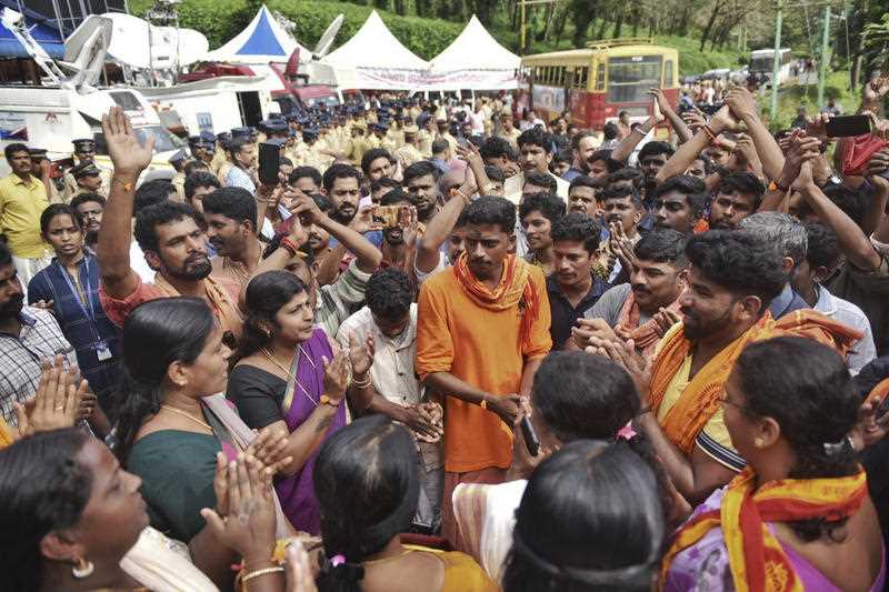 Protesters gather at Nilackal, a base camp on the way to the mountain sanctuary of Kerala, India.