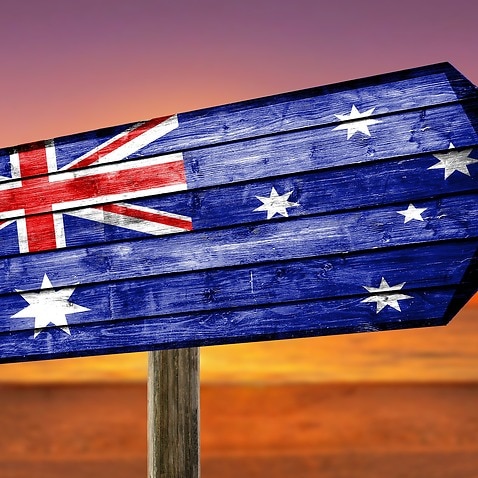 Image of an Australian flag painted on a wooden signage