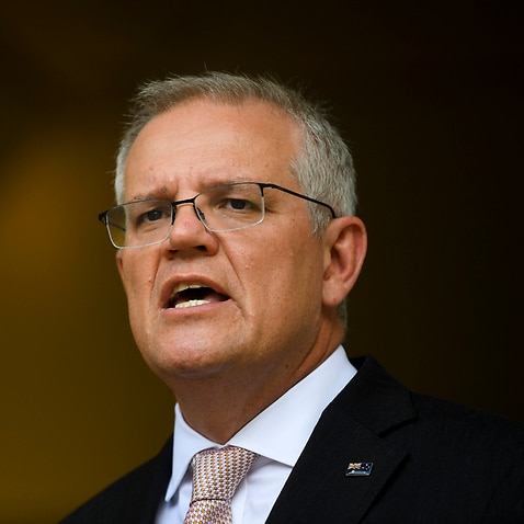 Prime Minister Scott Morrison speaks to the media during a press conference following a national cabinet meeting, at Parliament House in Canberra.