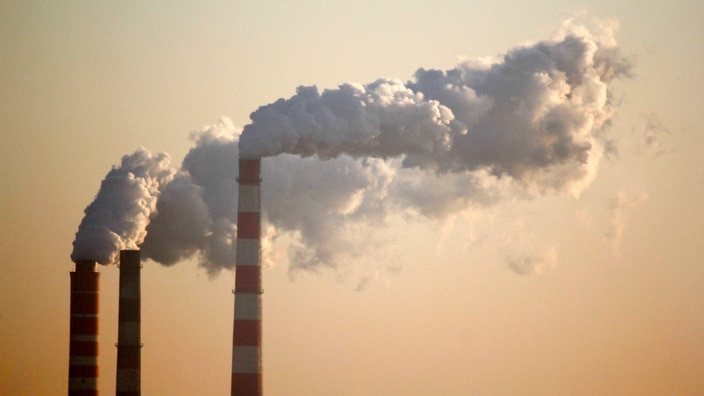 Emissions from chimneys at a coal-fired power plant in Ji%27nan city%2c east China (AAP)