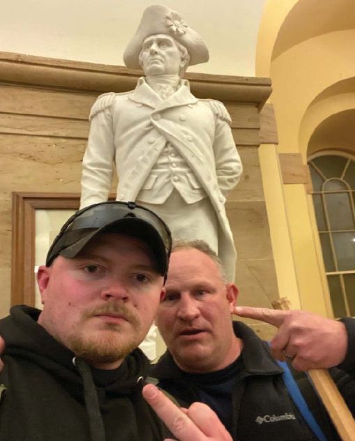 Police officers Thomas Robertson and Jacob Fracker took a selfie inside the US Capitol during an insurrection. US District Court
