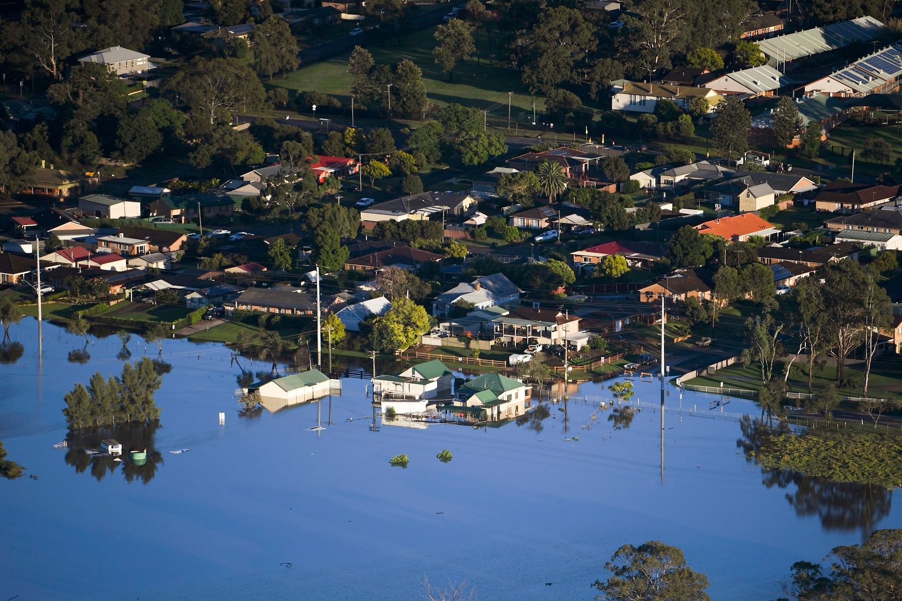 Buildings are partially submerged in floodwaters in the Windsor area, northwest of Sydney