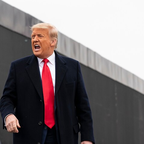 Donald Trump besucht am 12. Januar 2021 einen Abschnitt der Grenzmauer zwischen den USA und Mexiko in Alamo, Texas. 