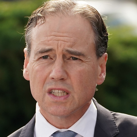 Australian Health Minister Greg Hunt speaks to the media during a press conference.