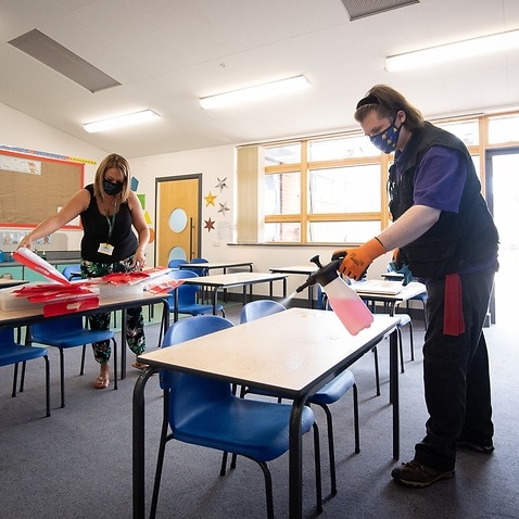 Desks disinfected in British school preparing to reopen