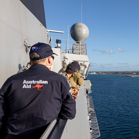 oyal Australian Navy's HMAS Adelaide, carrying disaster relief and humanitarian stores, sailing into the port of Nuku'alofa