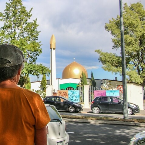 Two tourists of Christchurch stand opposite the Al Noor Mosque, they said they were shocked to hear someone had mad terror threats to be carried out there.