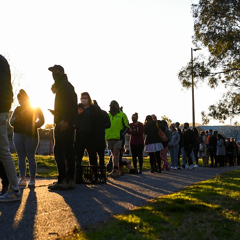 People cue in long lines outside a walk-in COVID19 testing clinic in Weston Creek, Canberra, Thursday, 12 August, 2021. 