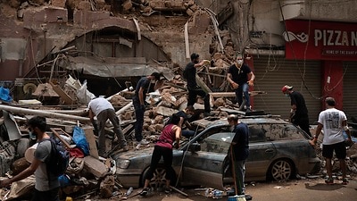 Rescuers are investigating possible signs of life in the rubble from the Beirut blast.