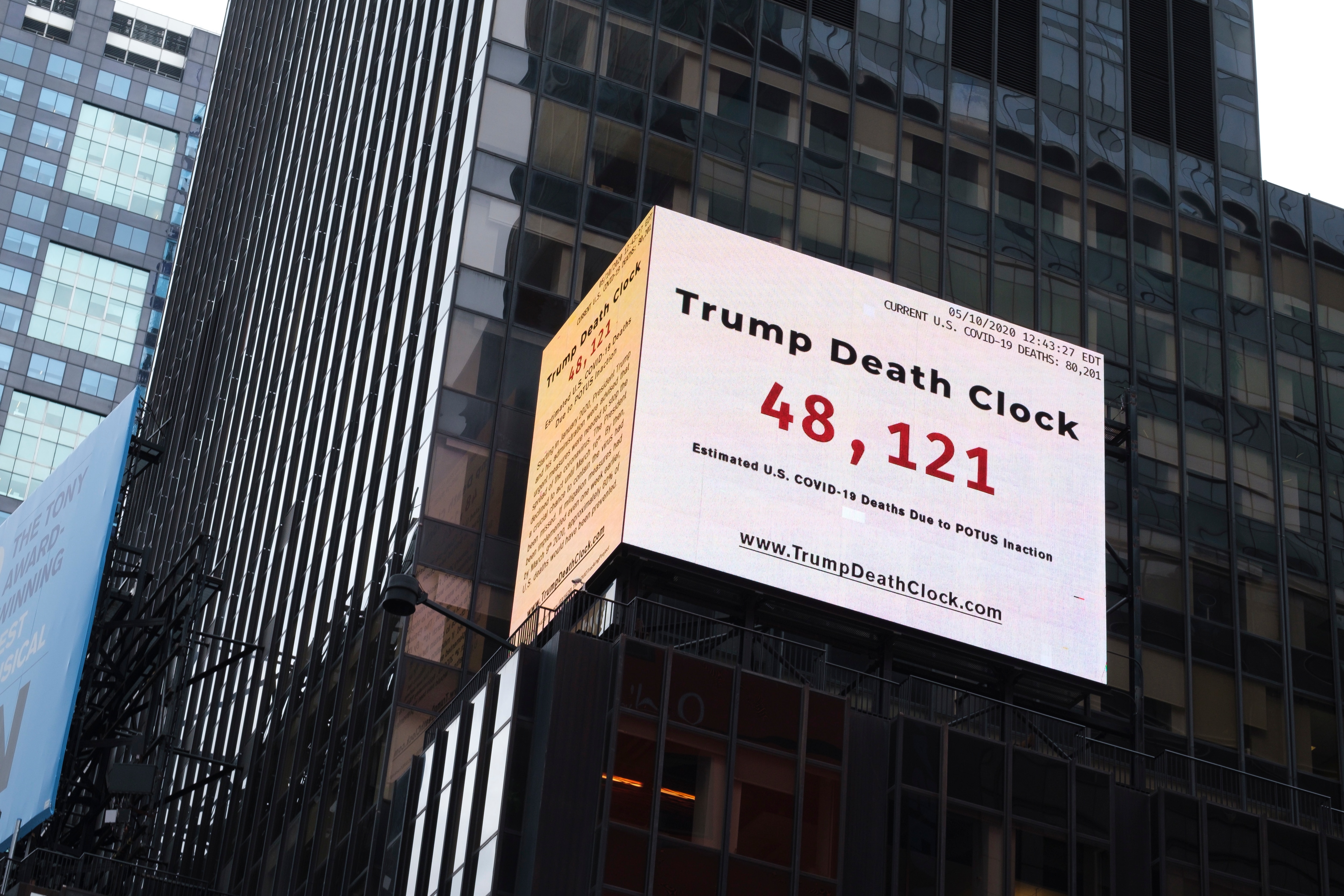 A billboard in Times Square shows the estimated number of people who have died of COVID-19 in the United States since the start of the coronavirus pandemic. A billboard in Times Square shows the estimated number of people who have died of COVID-19 in the United States since the start of the coronavirus pandemic.