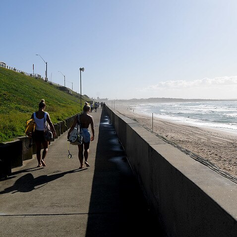 Social distancing at Cronulla Beach as the 500 person max gathering law takes place in Sydney, Saturday, March 28, 2020. (AAP Image/Simon Bullard) NO ARCHIVING