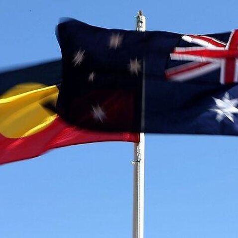Image of Aboriginal and Australian flags by Getty Images