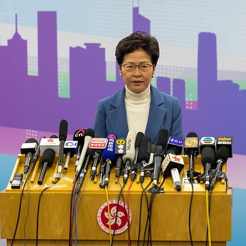 Hong Kong Chief Executive Carrie Lam speaks during a media briefing in Beijing