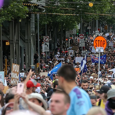 Protesters are seen during a rally against the state government's proposed pandemic laws, in Melbourne.
