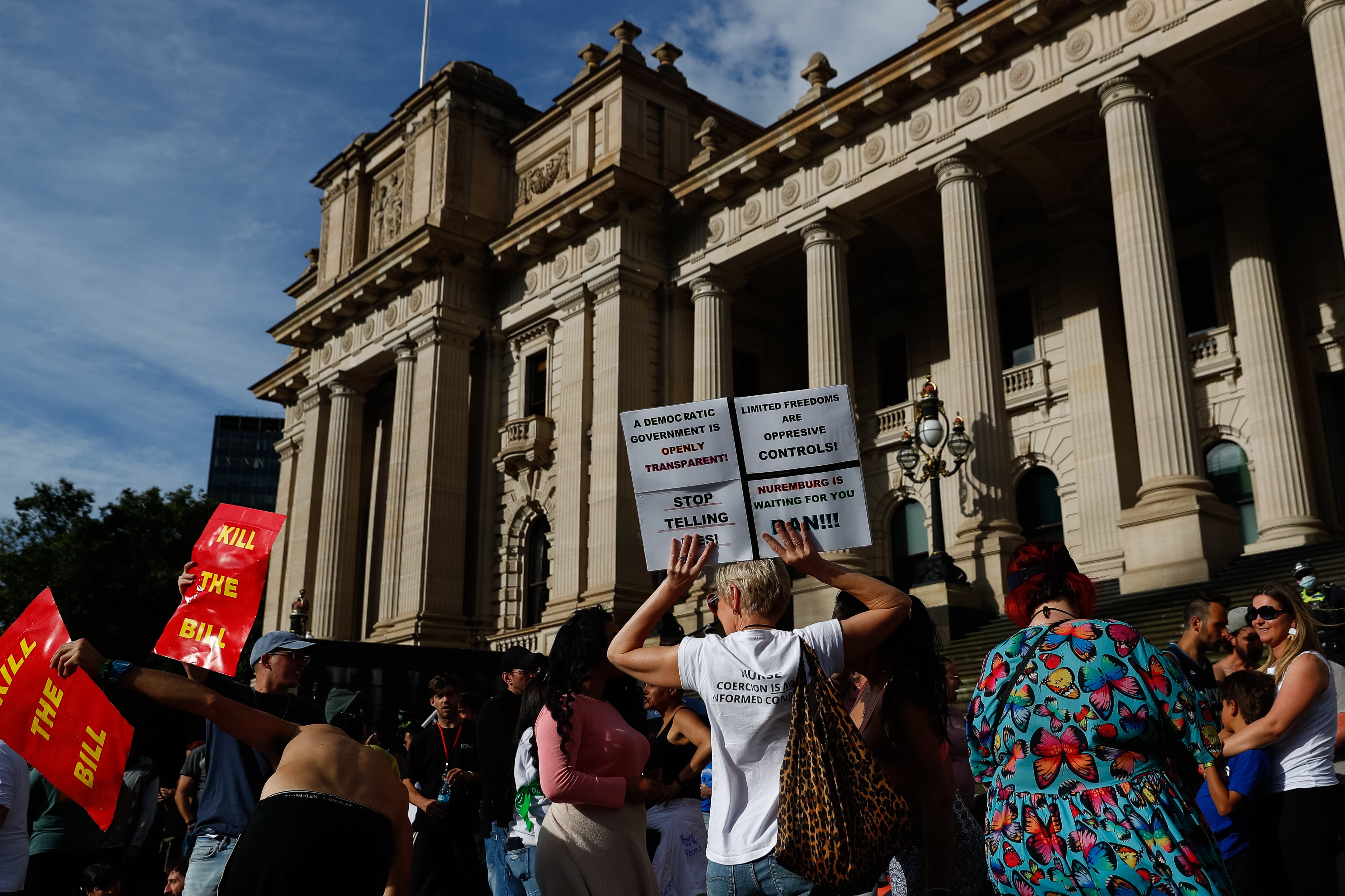Protesters are seen during a demonstration against the pandemic bill outside the Victorian State Parliament, in Melbourne on 18 November, 2021. 