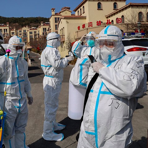 QINGDAO, CHINA - MARCH 14, 2022 - A rescue team carries out epidemic prevention and control disinfection work in the West Coast New Area in Qingdao, Shandong Province, China, March 14, 2022. (Photo by Costfoto/Sipa USA)