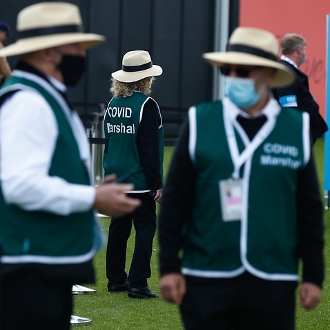 Covid Marshals are seen during Victoria Derby Raceday at Flemington Racecourse in Melbourne, Saturday, October 30, 2021