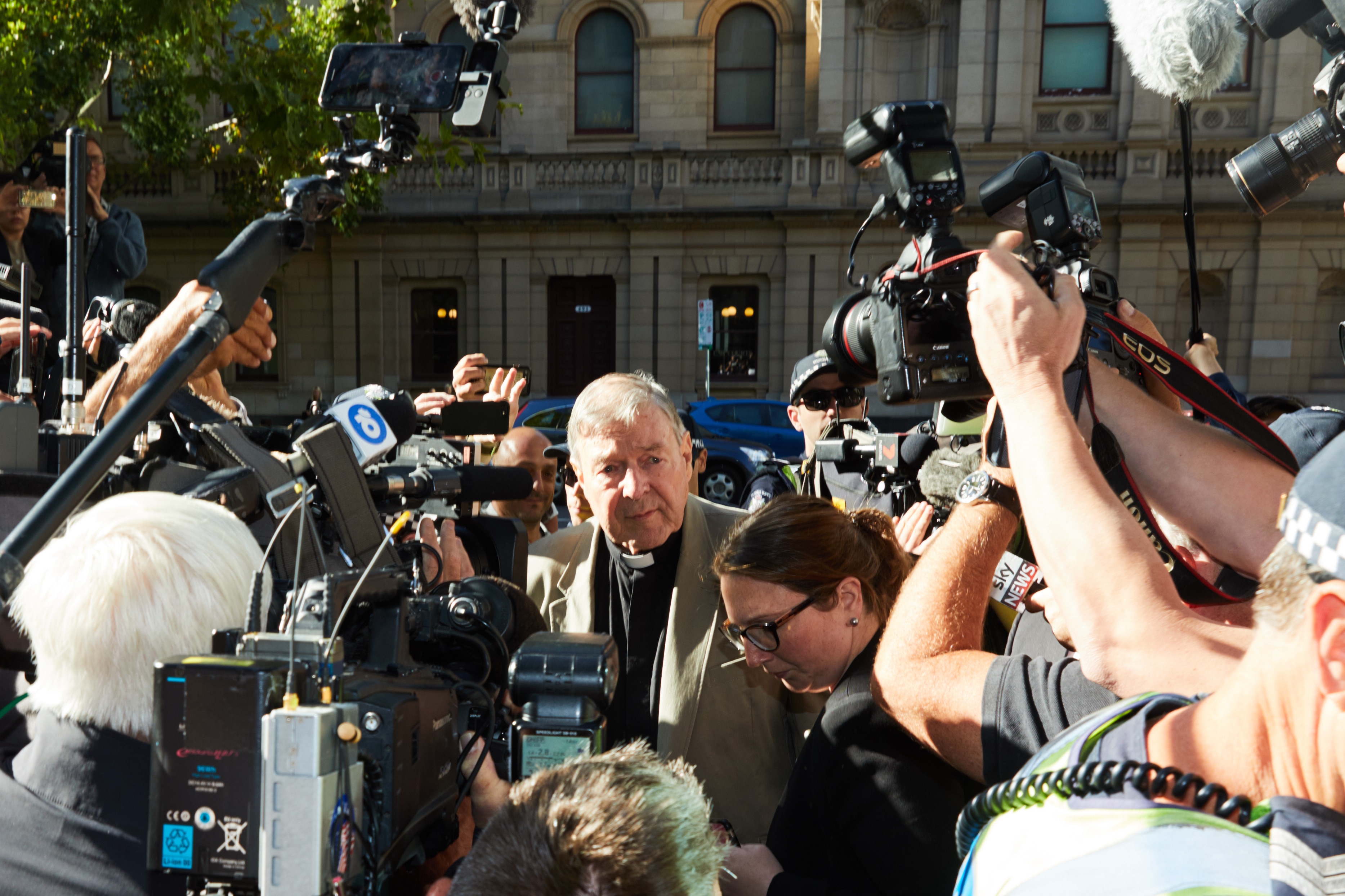 George Pell arrives at the County Court in Melbourne during earlier hearings.