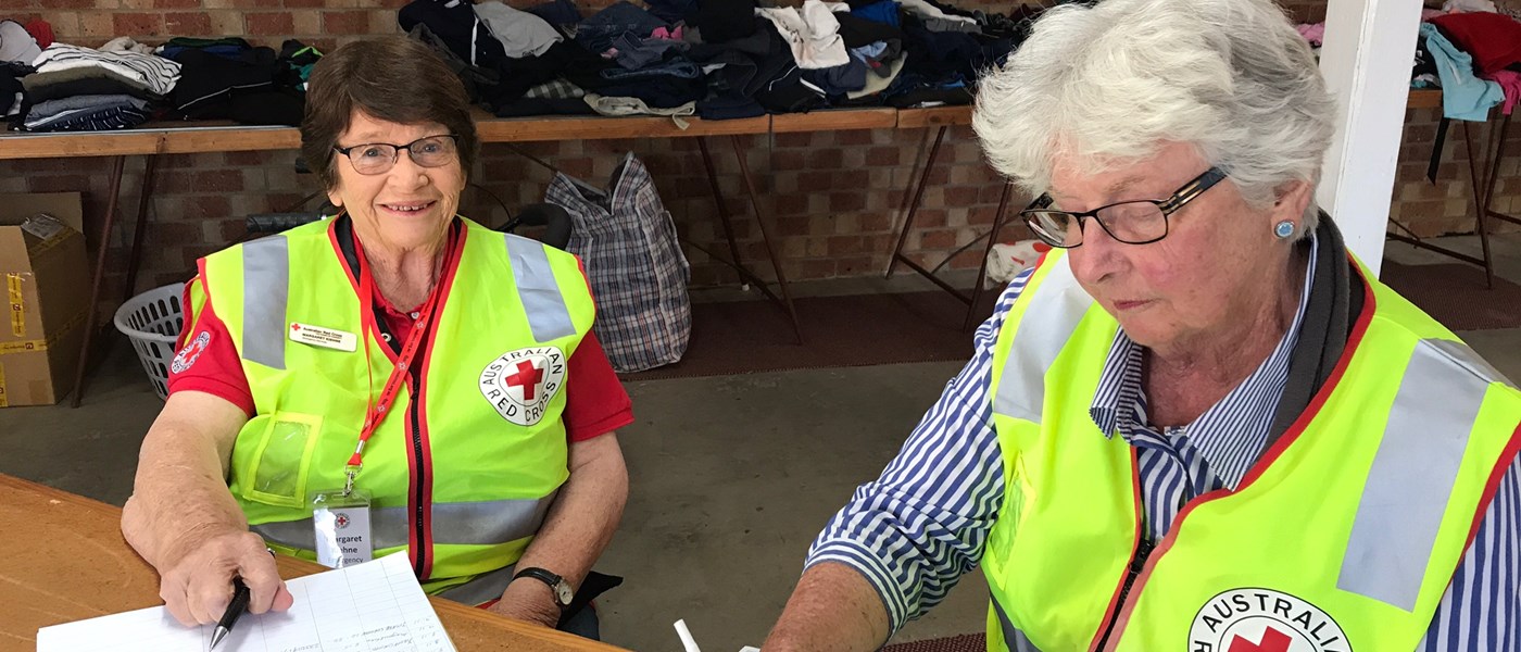 More than 60 Red Cross volunteers including Margaret Kiehne and Jenny Sloman are offering assistance at 16 evacuation centres across New South Wales.