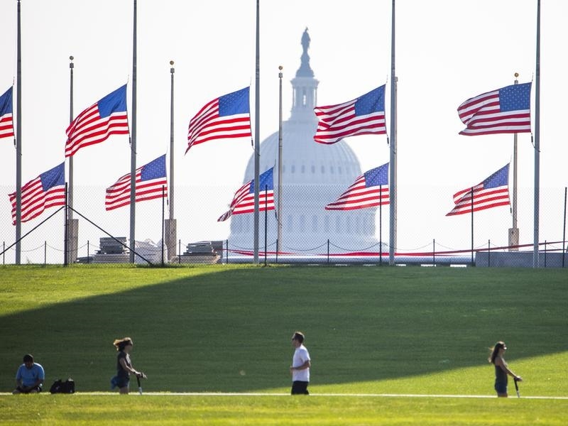 US flags fly at half-mast near the Washington Monument to honour Republican Senator John McCain. 