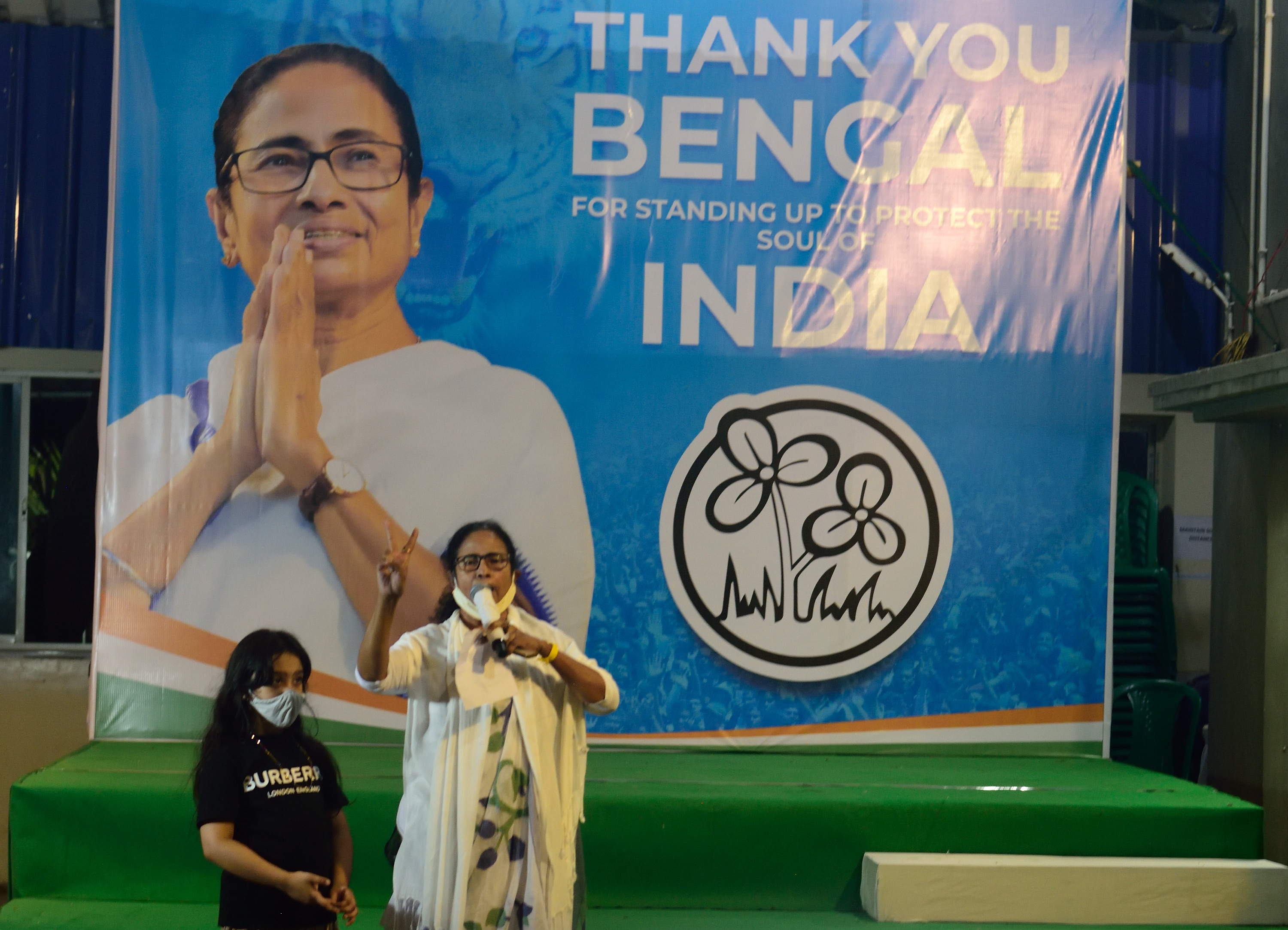 Chief Minister of West Bengal, Mamata Banerjee, makes a victory sign during a press conference celebrating TMC's victory on 2 May, 2021.