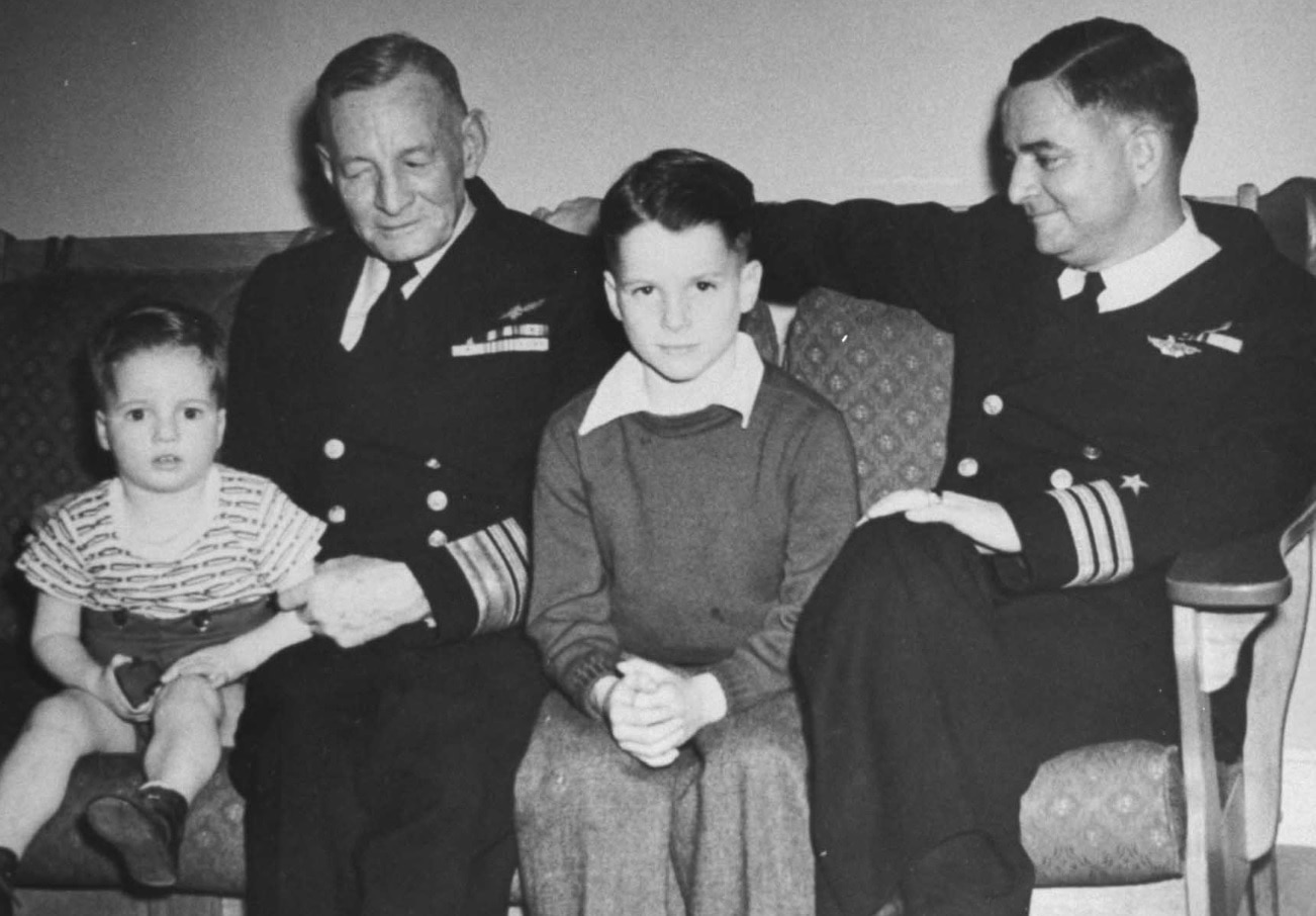 Future US Senator John S. McCain III (R-AZ) (C) as a young boy with his grandfather Vice Admiral John S. McCain Sr. (1884 - 1945) (L) in the 1940s