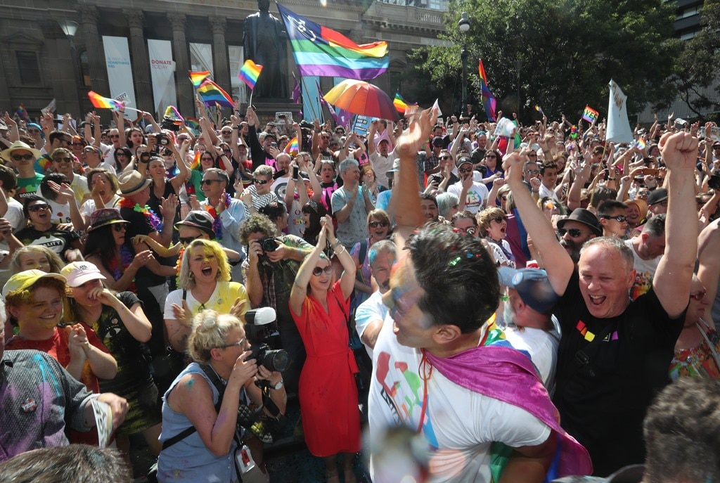 The crowd react to the same-sex marriage postal survey Yes result in front of the State library of Victoria in Melbourne