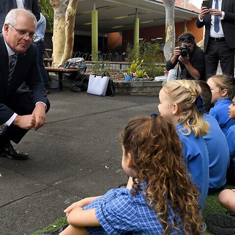 Australian Prime Minister Scott Morrison speaks to students the launch of ‘ReMade in Australia’ at Woollahra Public School in Sydney, Monday, December 6, 2021. 