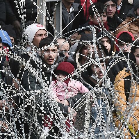 migrants waiting on the Turkish side of the Greece-Turkey borders near Kastanies