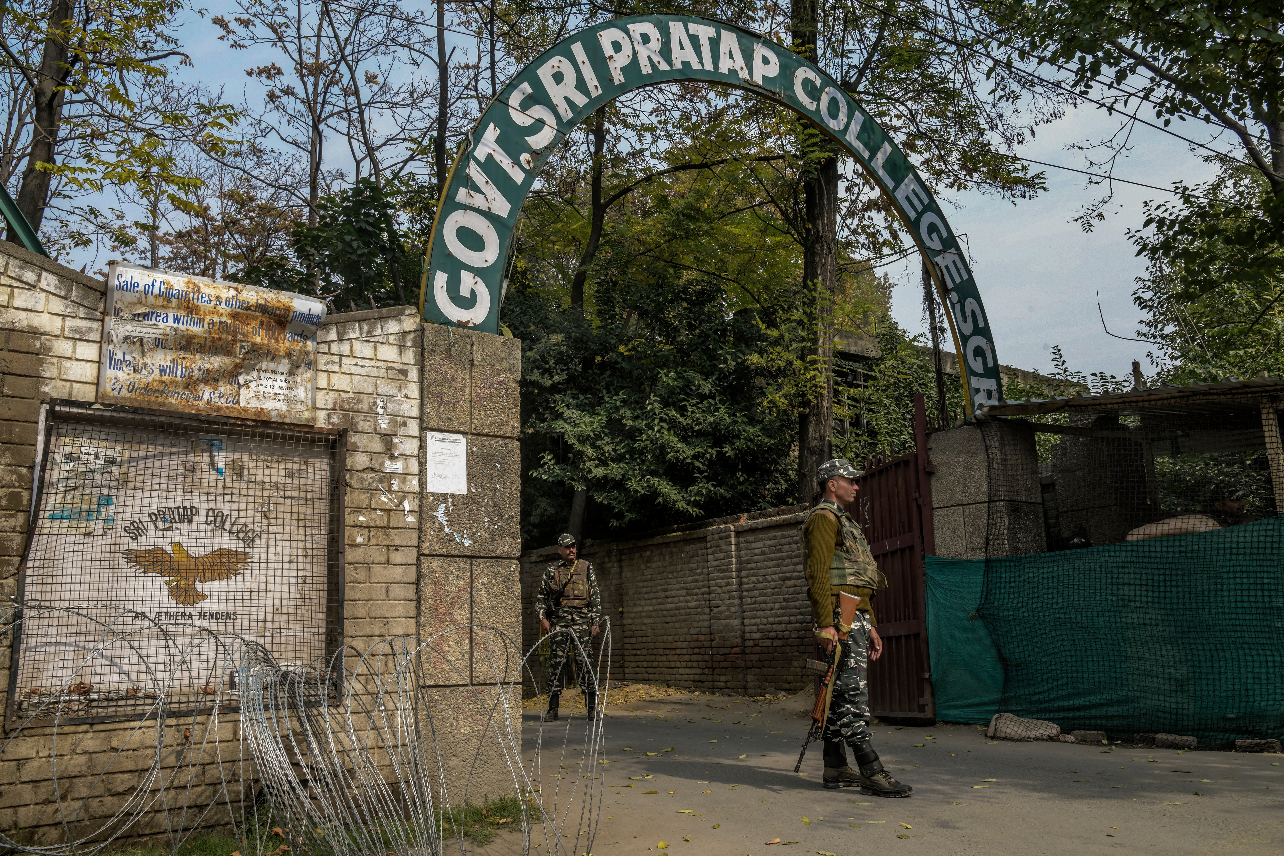 Security forces outside Sri Pratap College in Srinagar, India. Security forces outside Sri Pratap College in Srinagar, India.