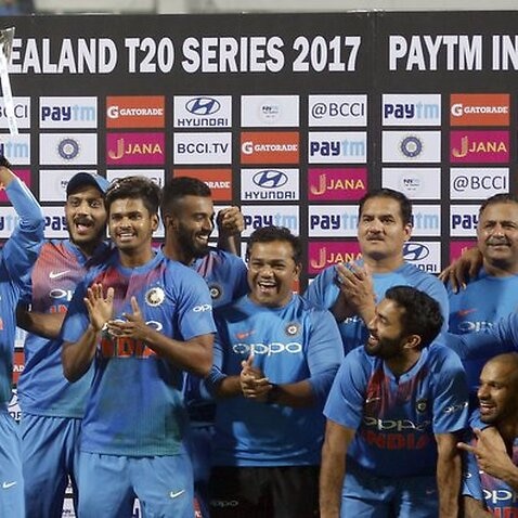 Members of Indian cricket team pose with the winners trophy after their win in their third Twenty20 international cricket match against New Zealand in Thiruvananthapuram, India, Tuesday, Nov. 7, 2017. India won the series 2-1. (AP Photo/Aijaz Rahi)