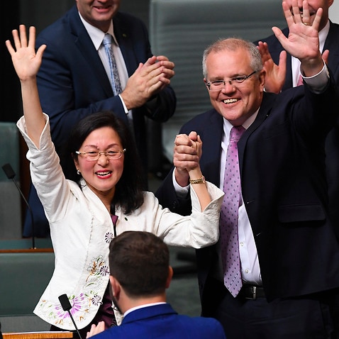 Gladys Liu is congratulated by Prime Minister Scott Morrison after delivering her maiden speech.