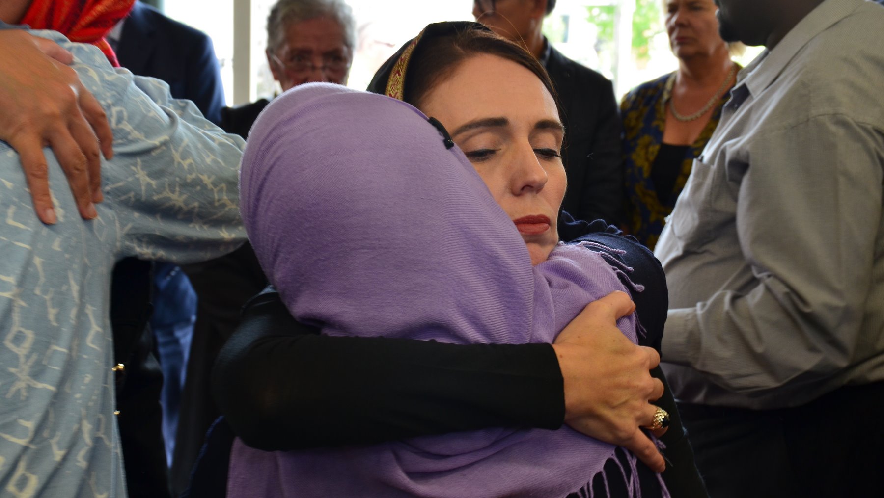 New Zealand Prime Minister Jacinda Ardern with members of the Muslim community after the shootings. 