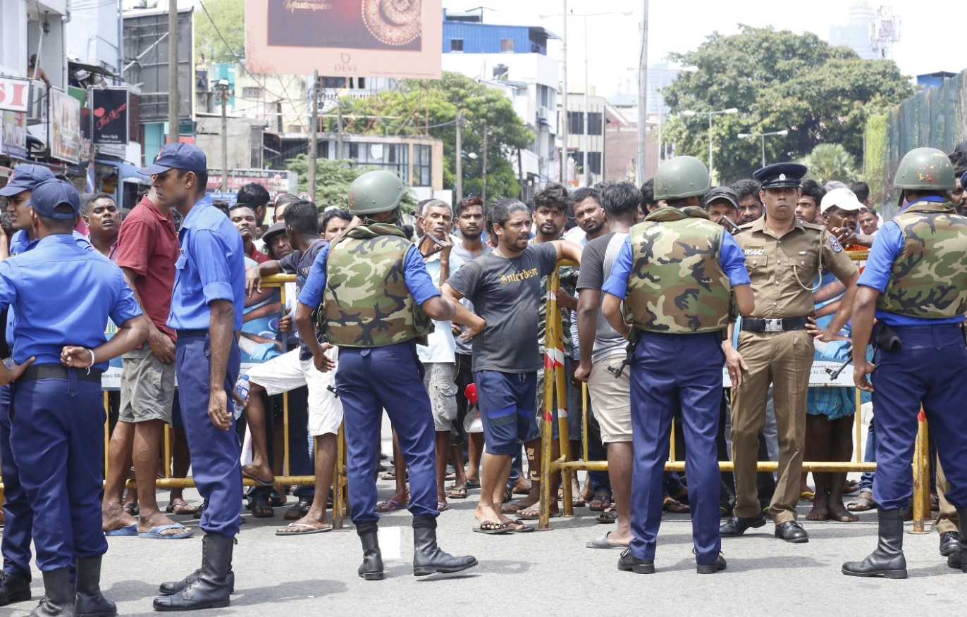 Police cordon off the area after a explosion hit at St Anthony's Church in Kochchikade in Colombo, Sri Lanka, 21 April 2019. 