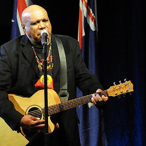 Archie Roach performs at the funeral of Lionel Rose at Festival Hall in Melbourne, Monday, May 16, 2011. Rose was today given a State Funeral as the first ever indigenous Australian to win a world boxing title. (AAP Image/Julian Smith) NO ARCHIVING