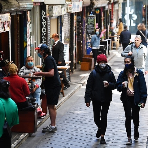 People are seen in Centre Place in Melbourne