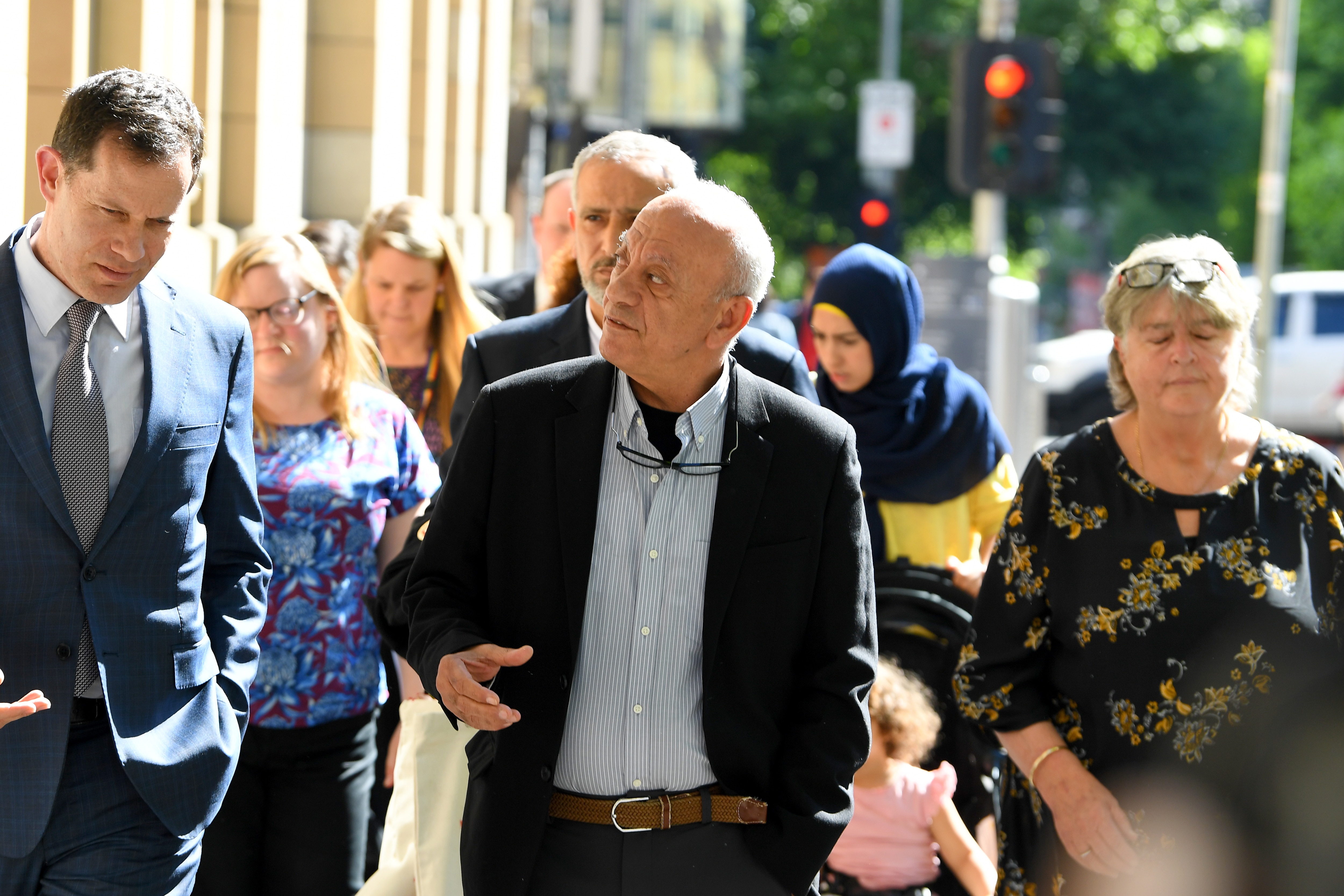 Saeed Maasarwe (centre), the father of murdered exchange student Aiia Maasarwe, arrives to the Supreme Court of Victoria in Melbourne.
