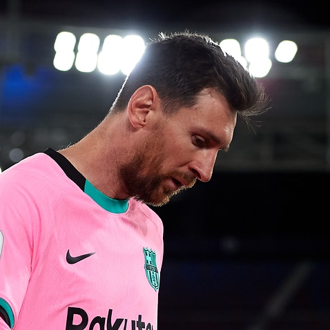 Lionel Messi reacts during a Barcelona match