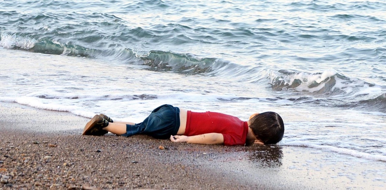 Alan Kurdi's body lies on the Bodrum coastline in September 2015.