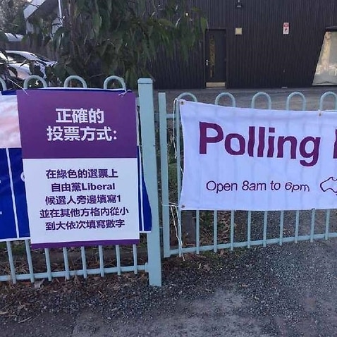 The AEC says Liberal posters in Chinese at polling booths in Melbourne have not broken any laws. 